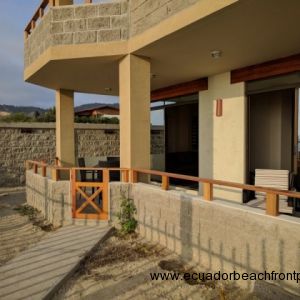 Spacious covered, beachfront patio with walkway to the beach and pool