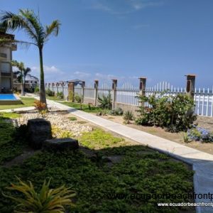 Garden and ocean views from your beachfront patio