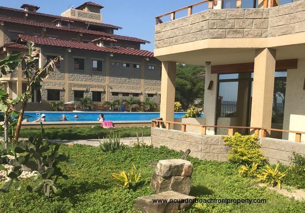 Beachfront patio, just steps to the sand and the swimming pool