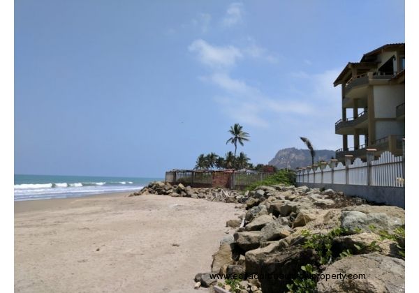 Sand beach in front of the condo, looking north