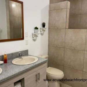 Spacious ensuite bath with double vanity and walk-in shower