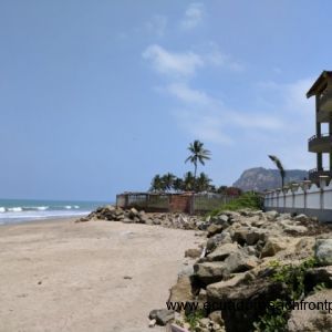 Sand beach in front of the condo, looking north