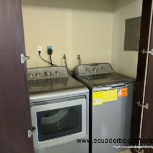 Laundry closet with washer and dryer