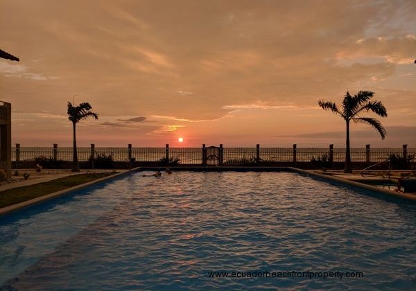 Beachfront swimming at sunset