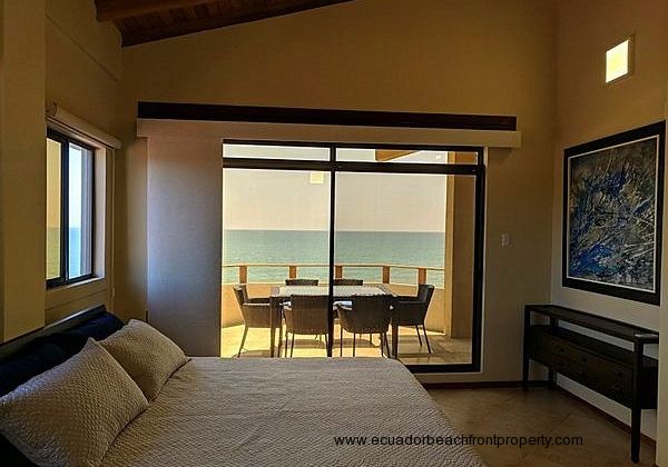 King bed in the oceanfront master bedroom