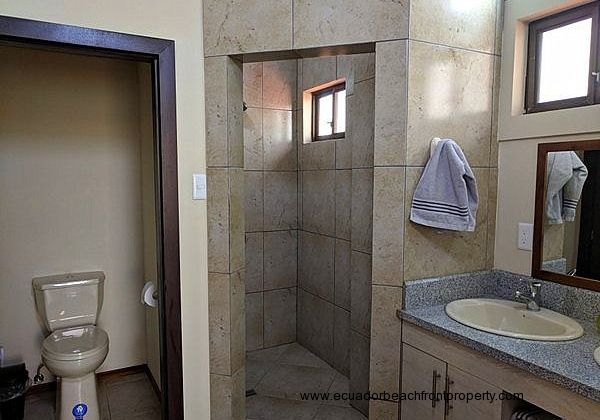 Spacious master ensuite with water closet, walk-in shower and double sinks