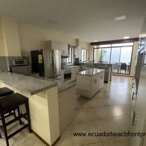 large kitchen with lots of countertop space