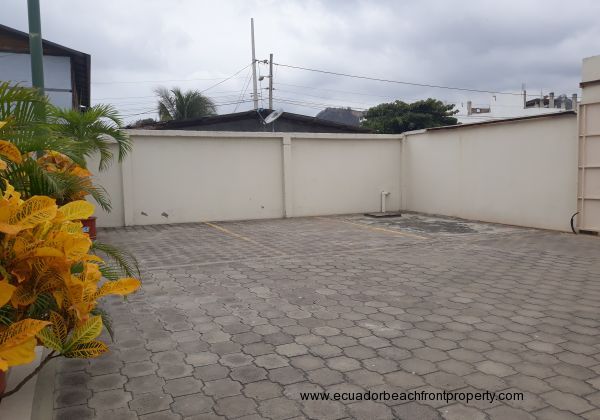 A view of the car park and the perimeter wall to optimize security.