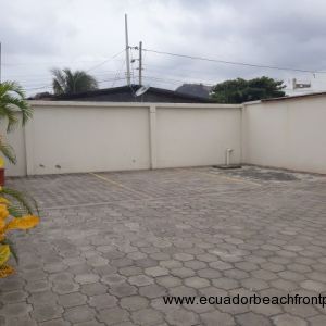 A view of the car park and the perimeter wall to optimize security.