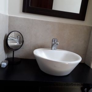 Modern fixtures in bathrooms.