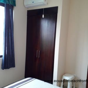 Built in closet and air conditioning unit in 3rd bedroom.