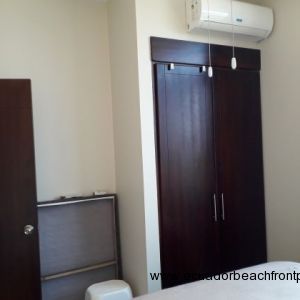 Built-in closet and air conditioning unit in bedroom 2.