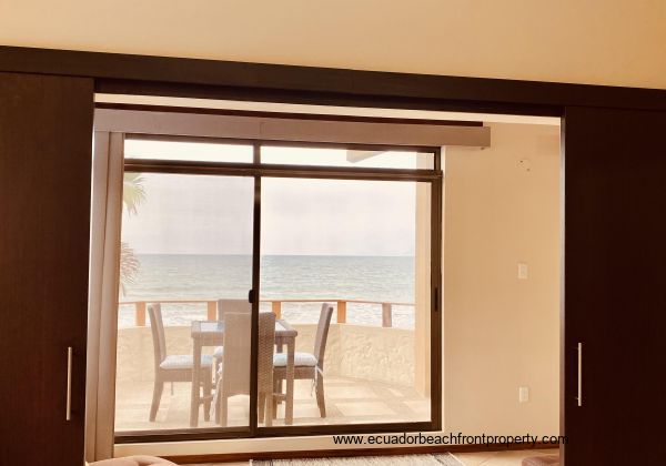 Patio doors out to the balcony that overlooks the beach.
