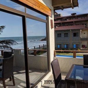 Ecuador Beachfront Condos. Spacious balcony with pool, garden and ocean views