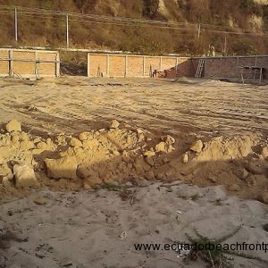 The lot as it was being filled and compacted according to building specifications
