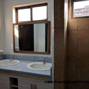 Master bath with double sinks and walk-in shower