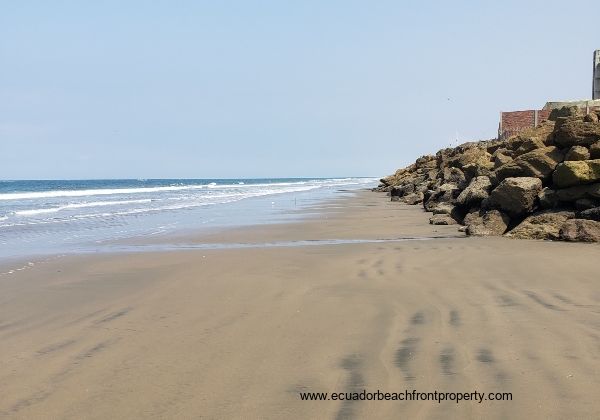 wide sand beach in front