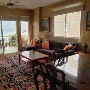 living and dining area with ocean views