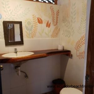 bath with hardwood countertop