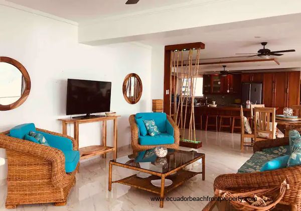 oceanview living area, looking towards the dining area and kitchen