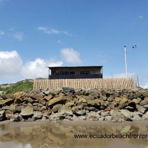 Looking up at the house from the beach