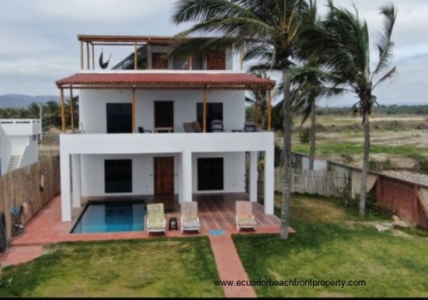 Large oceanfront yard and tiled patio