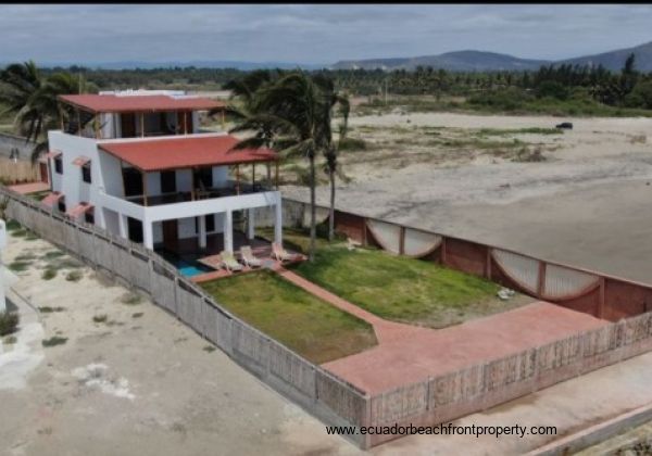 Beautiful sand beach directly in front of the home
