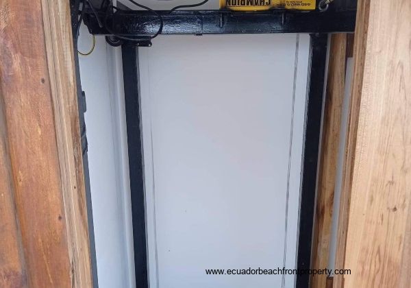 Custom steel frame and winch elevator