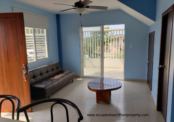 Living room with patio access