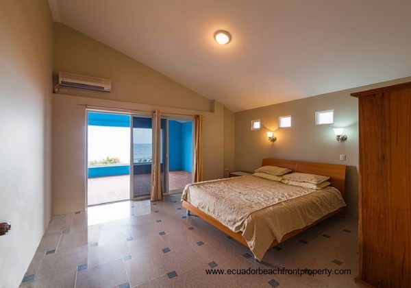 One of the spacious bedrooms with oceanview balcony