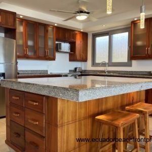 Spacious, well-equipped kitchen with hand-crafted cabinetry
