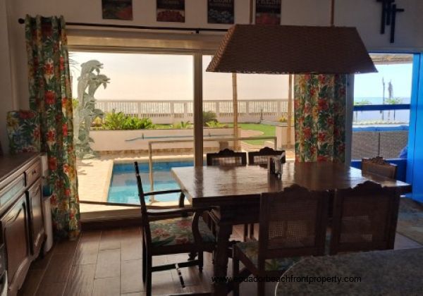 Dining area overlooking the pool