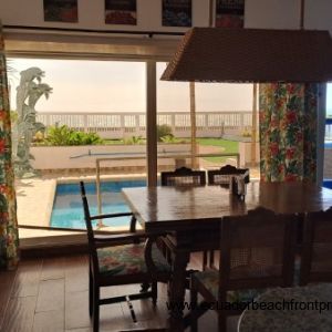 Dining area overlooking the pool