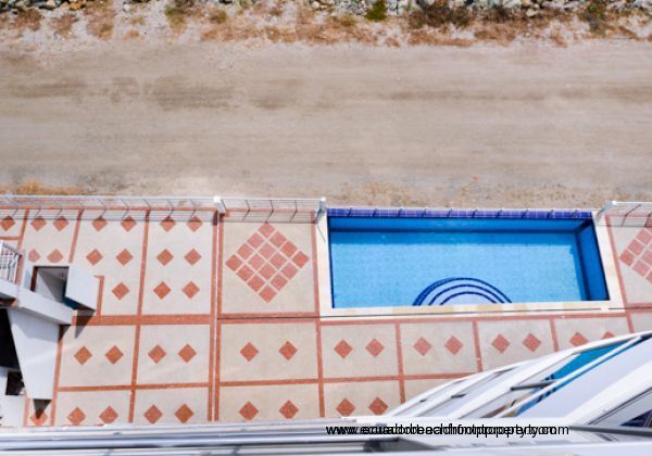 The view looking down towards the pool from the balcony.