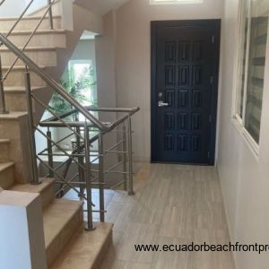 Doorway to balcony that overlooks the backyard patio