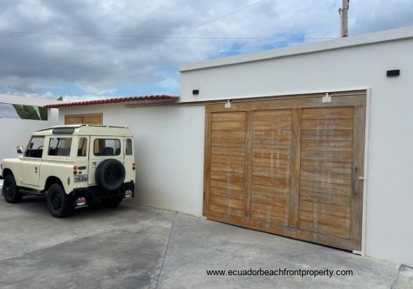 The sale includes a fully restorage vintage Land Rover