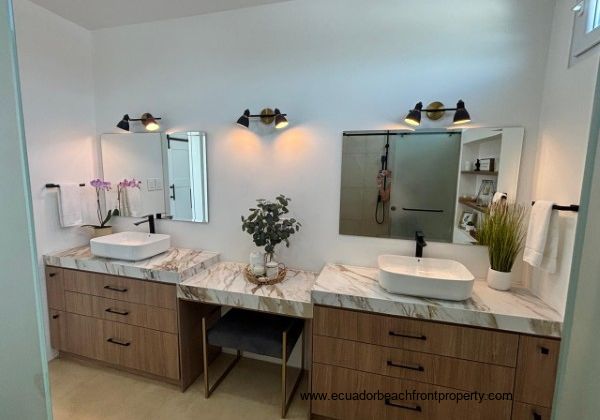 Ensuite bath with porcelain countertops with double vanity
