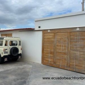 The sale includes a fully restorage vintage Land Rover