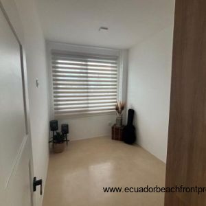 2nd floor, Third bedroom with window treatments and wardrobe 