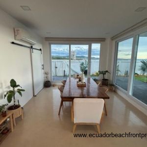Dining area with beautiful garden and pool views