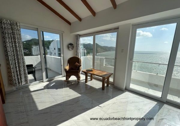 master suite with balconies on 2 sides 