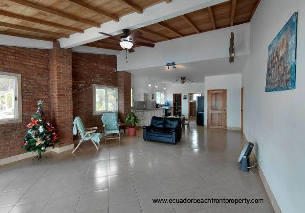 main level kitchen and living area off the oceanfront terrace 