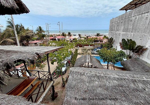 Pool and ocean view from the third level of Canoamar hotel in Canoa, Ecuador